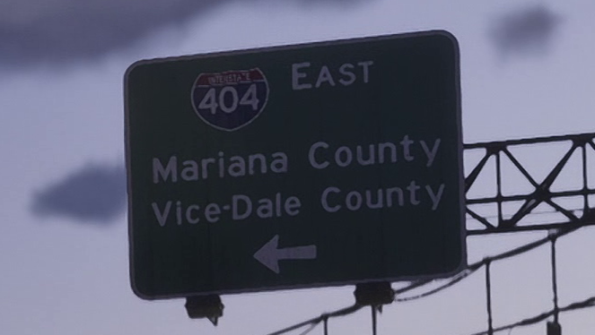 Road sign of 404 route east. Displaying signage to Mariana County and Vice-Dale County to the left.